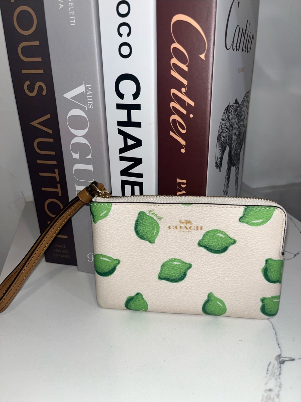 Coach Cream Wristlet with Green Lemon Print and Tan Strap
